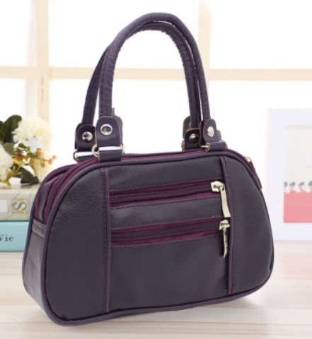 The Tia Mini Zip Bag